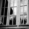 Young woman on the veranda of a country house