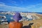 Young woman in violet beach hat