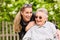 Young woman is visiting her grandmother in nursing home