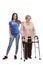 Young woman volunteer helping a senior lady with a walker