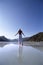 Young woman wading in lake