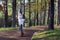 Young woman walking with her baby in a park