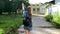 Young woman walking, jumping and enjoying on the street. Female model having fun on her vacation