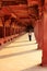 Young woman walking through Lower Haramsara in Fatehpur Sikri, U