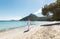 Young woman walking in a paradisiacal beach