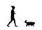Young woman walking with pet dog. Dog walker. Friendship. Dog walking concept. Vector illustration. Black silhouette