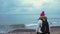 Young woman walking on the sea