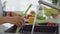 Young woman washing vegetables