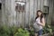 Young woman with watering can