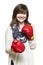 Young woman wearing boxing gloves smiling