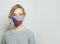 Young woman wearing a face mask with national flag Czech Republic. Flu epidemic and virus protection concept