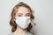 Young woman wearing medical mask closeup. Flu epidemic and virus protection concept