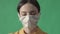 Young woman wearing a surgical mask