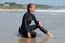 Young Woman in a Wetsuit at Beach