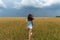 Young Woman In Wheat Field At Summer