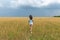 Young Woman In Wheat Field At Summer