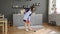 Young Woman Wiping Dust Using Mop at Home