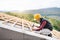 Young woman worker on the construction site.