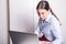 Young woman working concentrated on computer at office