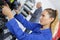 Young woman working in mechanic shop