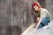 Young woman working with tape and preparing room for renovation home