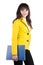 Young woman in yellow suit with the office folder.