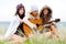 Young Women at the Beach With a Guitar