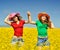 Young women on blooming field