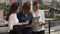 Young women in business clothes at a meeting. A group of businessmen in work in an informal setting. Business woman