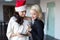 Young women couple online shopping for Christmas by tablet