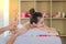 Young women enjoy hand massage from massage therapists in spa for beauty