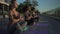 Young women group meditate in lotus pose on sunrise outdoor.