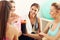 Young women group resting at the gym after workout