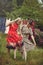 Young women hanging clothes after washing in the courtyard in the open air, female life and fun