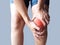 Young women with knee pain, Leg ache, suffering joint pain and muscle injury