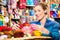 Young women in knitting shop