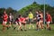 Young women play Australian Rules Football