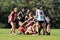 Young women playing Australian Rules Football