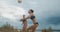 Young women are playing volleyball on beach at summer vacation, two professional team, slow motion shot, slender and