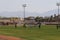 Young women plays soccer in the stadium