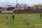 Young women plays soccer in the stadium