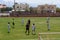 Young women plays soccer in the stadium