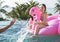 Young women on a pool inflatable