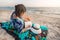 Young women is reading on the beach at thailand summer season