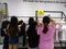 Young women are shopping for clothes during the night at the clothing store