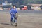 Young worker on his bike in the early morning, Beijing, China.