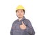 Young worker thumbing up with yellow hard hat in front of white background