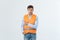 Young workman annoyed angry in furious gesture. Negative expression on white grey background