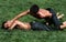 A young wrestler is forced to the ground by his opponent at the Elmali Turkish Oil Wrestling Festival, Turkey.
