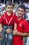 A young wrestlers displays his brothers medal won at the Elmali Turkish Oil Wrestling Festival in Turkey.